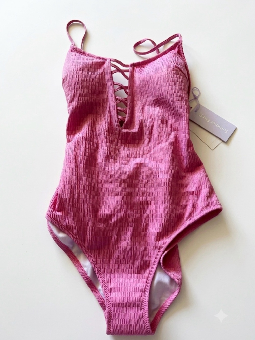 Pink Textured One-Piece Swimsuit with Lace-Up Front